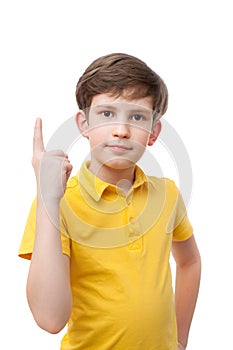 boy making attention gesture with forefinger