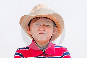 Boy making a disgusted face.