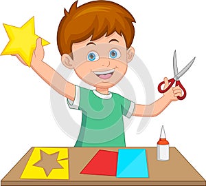 boy making paper crafts