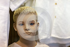 Boy mannequin in store