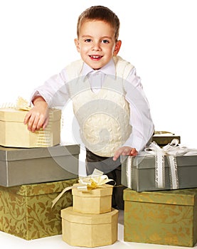 Boy with many gift boxes