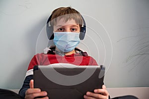 Boy with mask at home