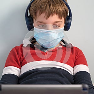 Boy with mask at home