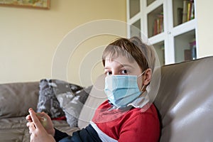 Boy with mask at home