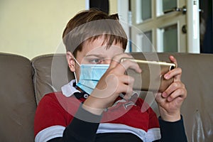 Boy with mask at home