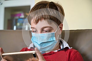 Boy with mask at home