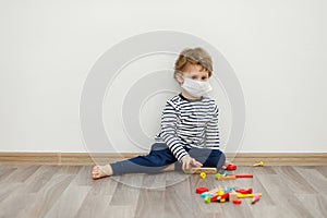 Boy in mask. Stay home concept, quarantine from Coronavirus Covid-19