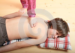 Boy massaged by a girl