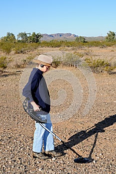 Boy with a metal detector
