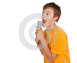 Boy with microphone and lots of copyspace