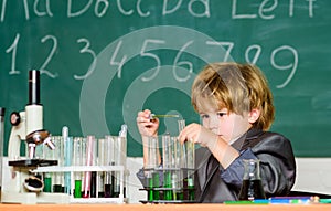 Boy microscope and test tubes school classroom. Knowledge concept. Fascinating subject. Knowledge day. Kid study biology