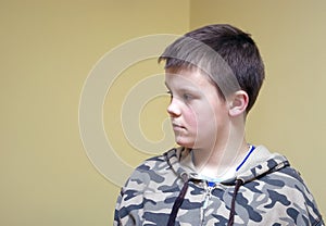 Boy in military blouse