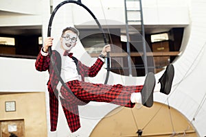 Boy mime in the air on a circle