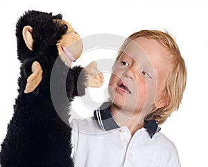Boy with monkey puppet