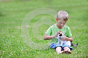 Boy with motley cat