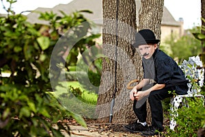 Boy in Mustache and Black Hat