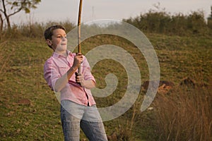 Boy in nature, fishing