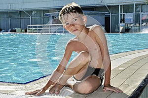 Boy near the swimming pool