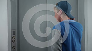 Boy nervous while waiting for his elevator lift