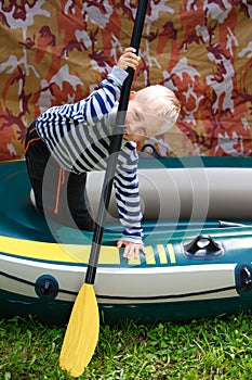 Boy with oar photo