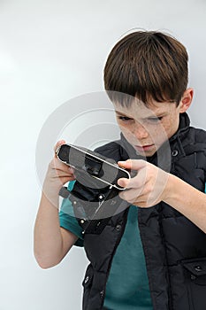 Boy with  an old  analog  photo camera