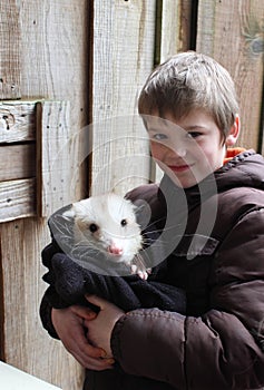 Boy with an Opossum