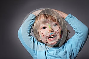 Boy with painted faces