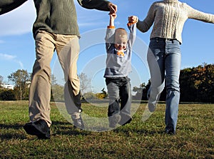 Boy and parent's hands