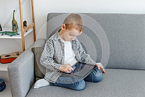 Boy without parental control wasting time playing games