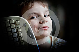 Boy with PC keyboard