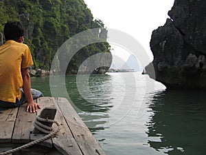 Boy peering out to sea