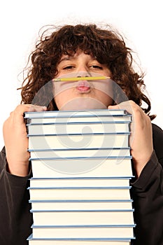 Boy with pencil and books photo