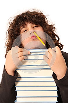 Boy with pencil and books photo