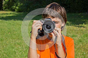 Boy with photocamera