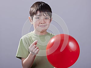 Boy with pin and ballloon.