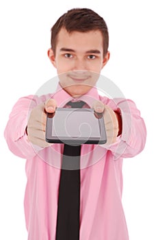 Boy in a pink shirt hold a tablet PC