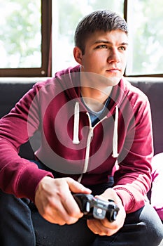 boy plaing video games.