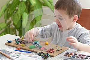 Boy with plasticine