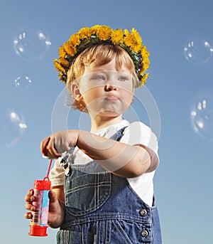 Boy play in bubbles