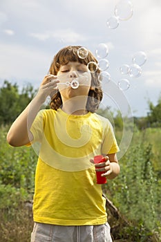 Boy play in bubbles