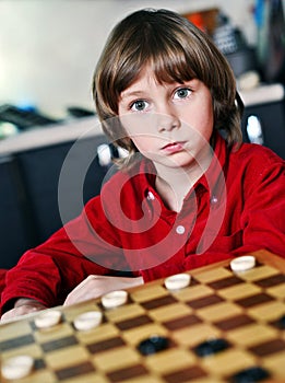 Boy play chess