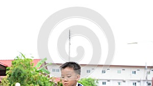 Boy play football in the ground