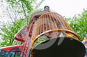 Boy on play set