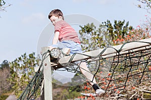 Boy Playground Climbing Netting