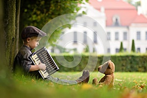 A boy playing accordion