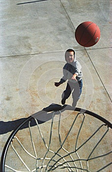 Boy playing basketball