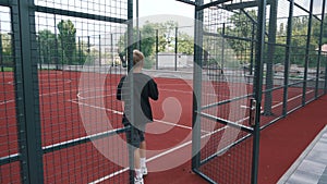 boy playing basketball on the court