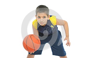 Boy playing basketball isolated