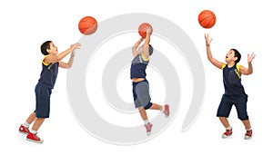 Boy playing basketball isolated