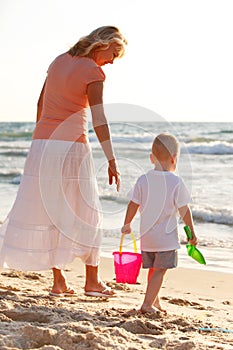 Boy playing on the beach